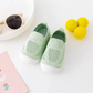 Lauflernschuhe Matteo™ – Weiche Barfußschuhe mit rutschfester Soft-Sohle für die ersten Schritte in der Farbe grün.